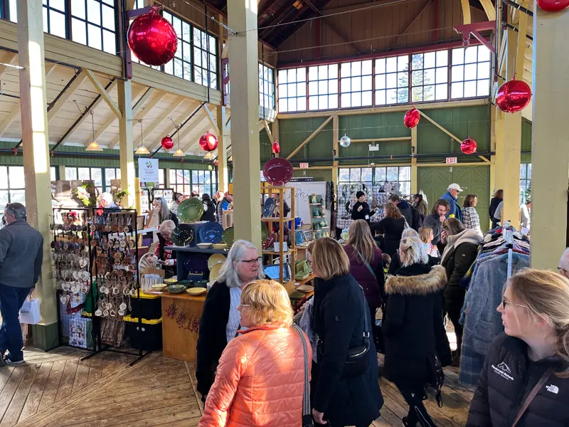 Wide view of the 2025 Holly Jolly Market in Picton showcasing the beautiful architecture and festive decor.